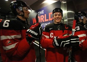 TORONTO, CANADA - JANUARY 2: Canada's Curtis Lazar #26, Shea Theodore #6 and teammates get set to take on Denmark during quarterfinal round action at the 2015 IIHF World Junior Championship. (Photo by Andre Ringuette/HHOF-IIHF Images)
